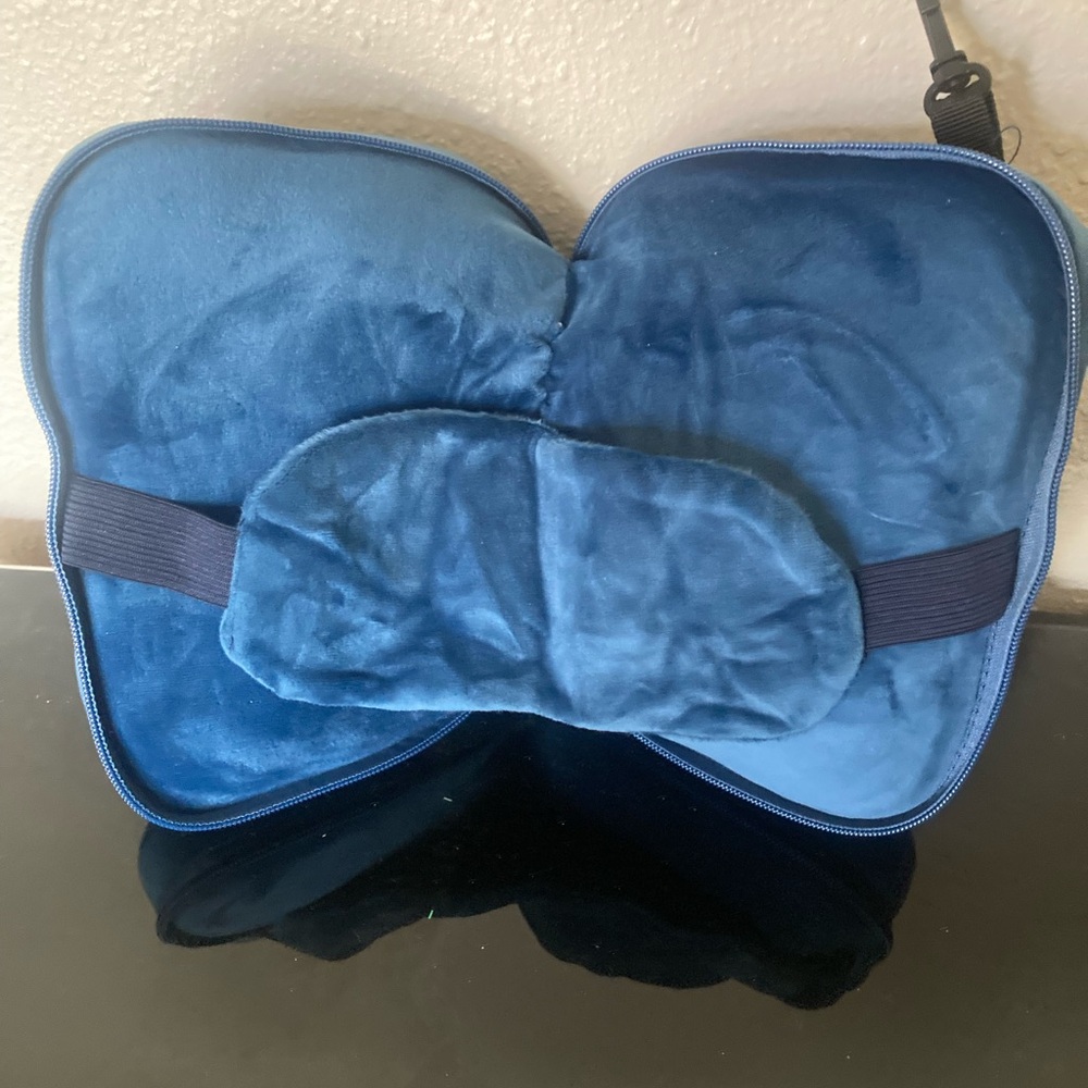 Travel pillow with eye mask. 
Blue Memory Foam Cushion